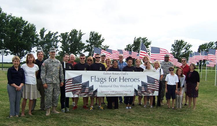 Volunteers, including Easton Rotarians and local members of our armed forces, assisted with the display of 503 American flags throughout Easton for the Rotary Club of Easton’s second annual “Flags for Heroes” event.  