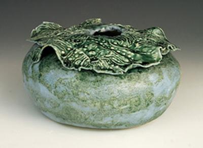 "Blue Green pot with lace collar", by Signe Hanson 