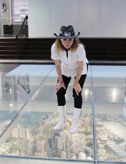     Natalie Jeremijko surveys a three dimensional replica of Sydney, Australia.