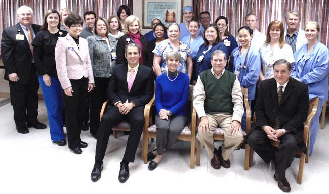 Brenda and Jim Davidson (front, center) recently visited UM Shore Medical Center at Easton to visit the members of the medical and nursing staffs, who she credits for the exceptional care they provided her while being treated for a brain tumor. Among those nominated included Dr. Khalid Kurtom (front, left) and Dr. Walid Kamsheh (front, right). 