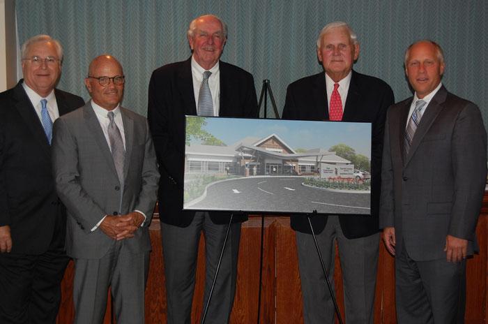 Pictured with the architectural renderings of the Clark Comprehensive Breast Center are F. Graham Lee, vice president of philanthropy, UM Shore Regional Health; Charles Capute, chair, UM Memorial Hospital Foundation Board of Trustees; Moorhead Vermilye, vice-chair, UM Memorial Hospital Foundation Board of Trustees and Comprehensive Breast Center campaign chair; John Dillon, chair, UM Shore Regional Health Board of Directors; and Ken Kozel, president and CEO, UM Shore Regional Health. 
