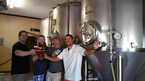 Pictured from left to right: Eastern Shore Brewing's Zach Milash (Brewmaster), Cory Edwards (Beer Server), Jay Hudson (General Manager), Adrian Moritz (co-owner). Co-owner Lori Moritz is not pictured.